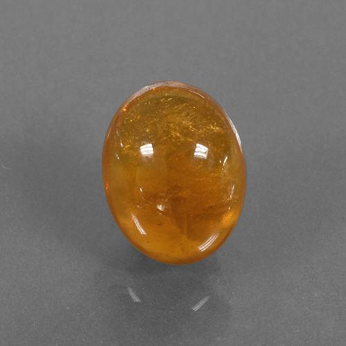 Granada espessartita laranja natural 3,03ct, corte oval, translúcido