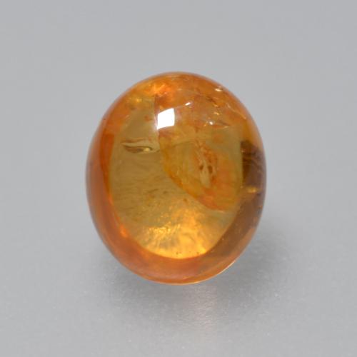 Granada espessartita laranja natural 0,91ct, corte oval, transparente