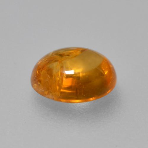 Granada espessartita laranja natural 0,91ct, corte oval, transparente