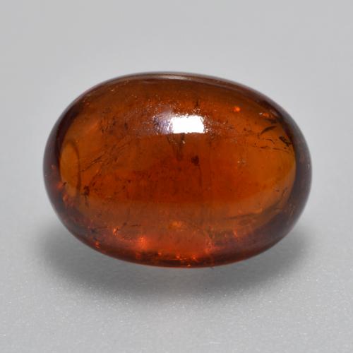 Granada espessartita laranja natural 5,72ct, corte oval, translúcido