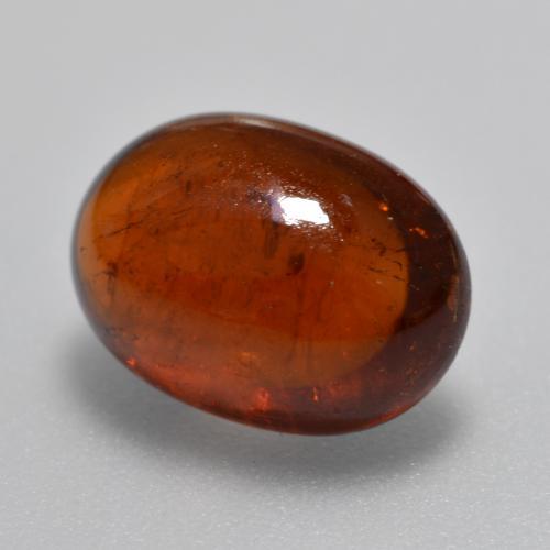 Granada espessartita laranja natural 5,72ct, corte oval, translúcido