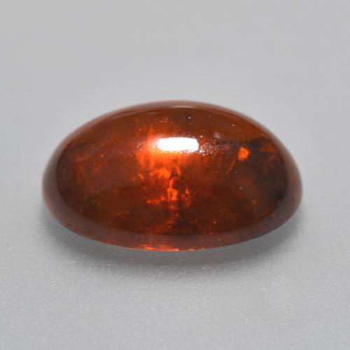Granada espessartita laranja natural 5,72ct, corte oval, translúcido