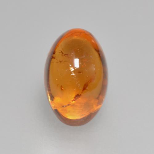 Granada espessartita laranja natural 0,97ct, corte oval, transparente