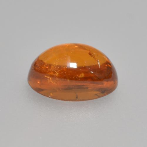 Granada espessartita laranja natural 0,97ct, corte oval, transparente