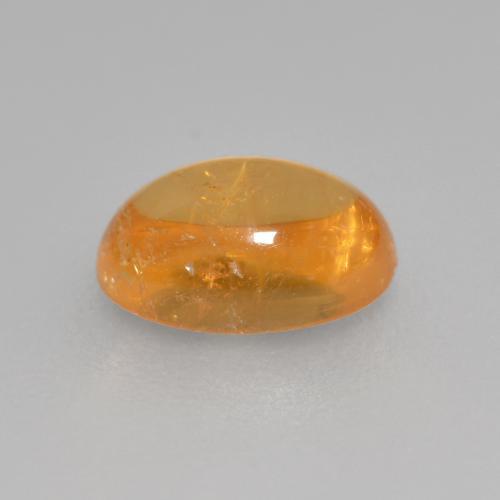 Granada espessartita Laranja-Ouro Natural 0.82ct, Corte Oval, Transparente