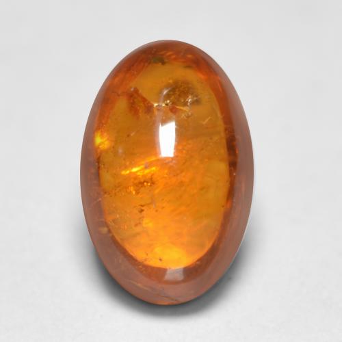 Granada espessartita laranja natural 0,81ct, corte oval, transparente