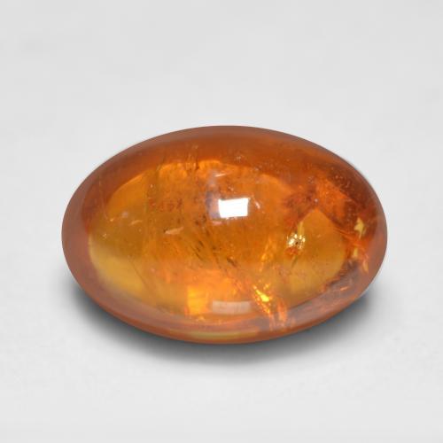 Granada espessartita laranja natural 0,81ct, corte oval, transparente