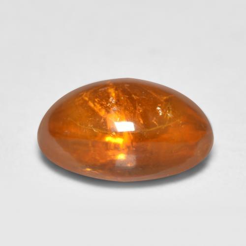 Granada espessartita laranja natural 0,81ct, corte oval, transparente