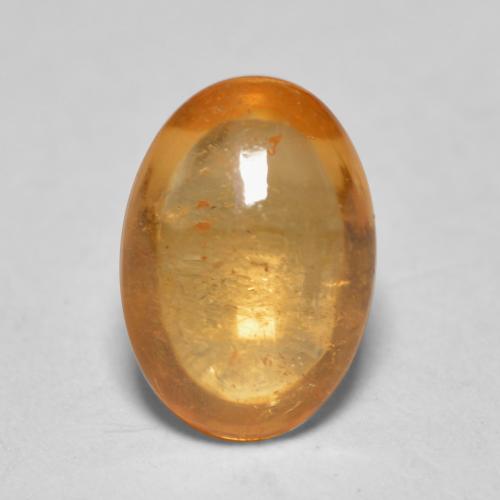 Granada espessartita laranja natural 0,82ct, corte oval, transparente