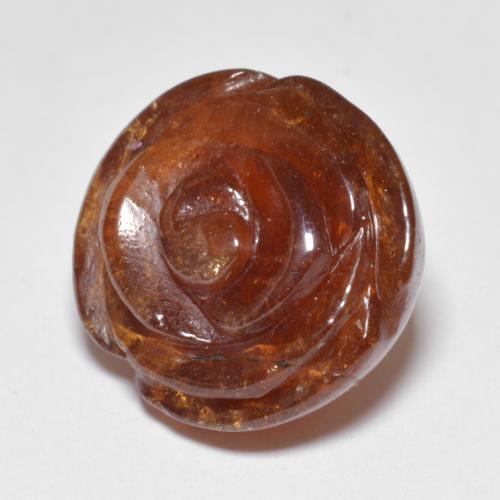 Granada espessartita laranja natural 22,72ct, corte flor, translúcido
