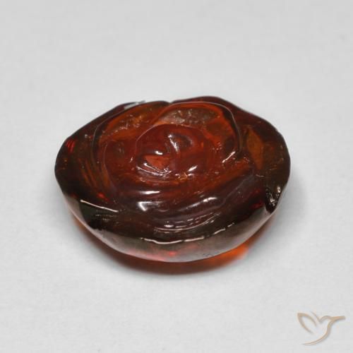 Granada espessartita laranja natural 10,05ct, corte flor, translúcido
