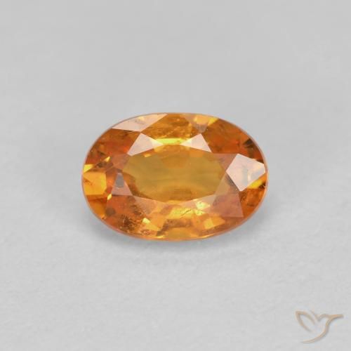 Granada espessartita Laranja brilhante Natural 0.56ct, oval, VS-SI