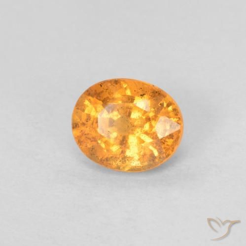 Granada espessartita Laranja brilhante Natural 0.57ct, oval, VS-SI