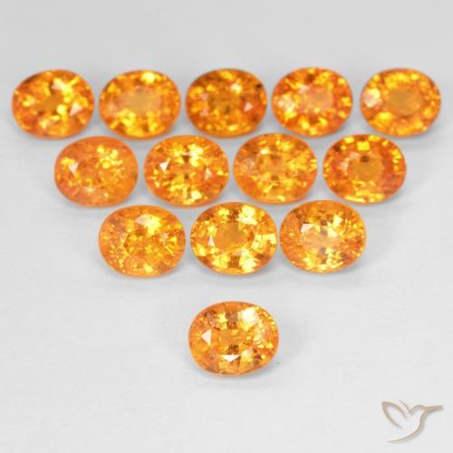 0.63ct Natural Laranja Intenso Granada espessartita, oval, VS
