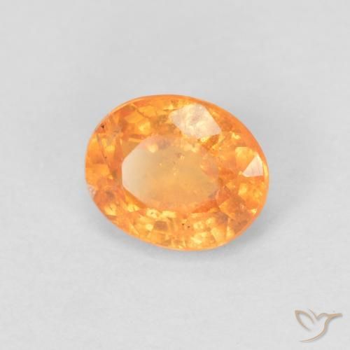 Granada espessartita Laranja brilhante Natural 0.53ct, oval, VS-SI