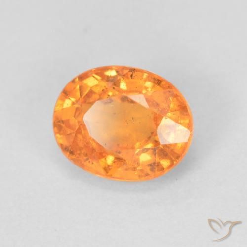 Granada espessartita Laranja brilhante Natural 0.56ct, oval, VS-SI