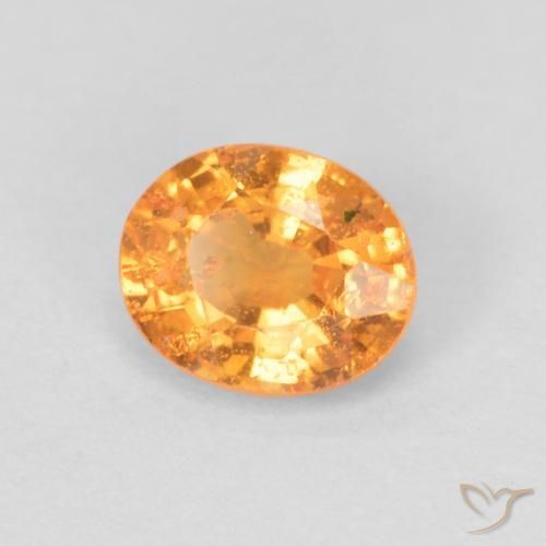 Granada espessartita Laranja brilhante Natural 0.56ct, oval, VS-SI