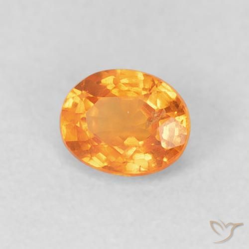 Granada espessartita Laranja brilhante Natural 0.53ct, oval, VS
