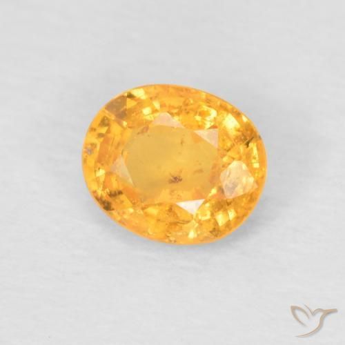 Granada espessartita Laranja escuro-dourado Natural 0.52ct, oval, VS