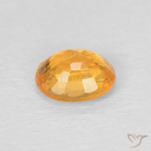 Granada espessartita Laranja escuro-dourado Natural 0.52ct, oval, VS