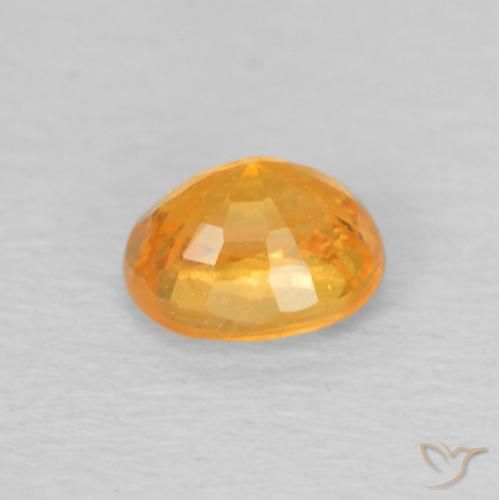 Granada espessartita Laranja escuro-dourado Natural 0.58ct, oval, VS