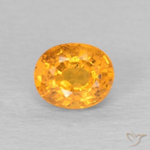 0.64ct Natural mel de laranja Granada espessartita, oval, VS