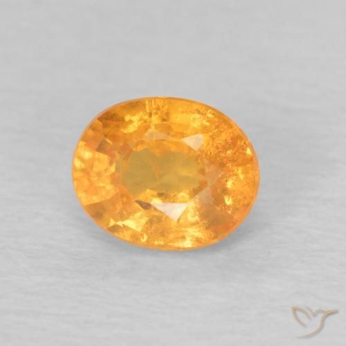 Granada espessartita Laranja Intenso Natural 0.62ct, oval, VS