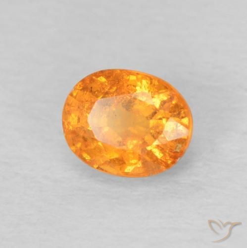 Granada espessartita Laranja brilhante Natural 0.58ct, oval, VS-SI