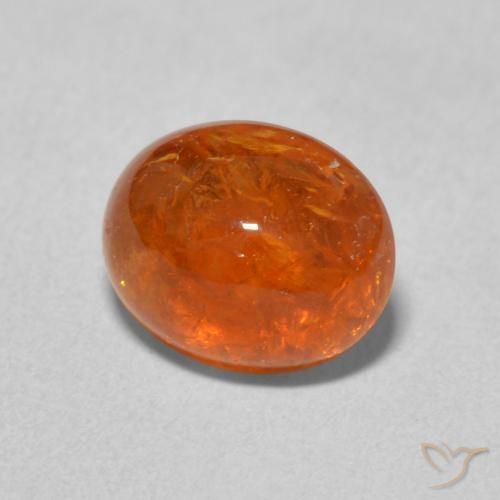 Granada espessartita Laranja Médio Natural 3.86ct, oval, Transparente