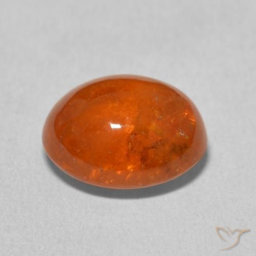 Granada espessartita Laranja Médio Natural 4.85ct, oval, Transparente