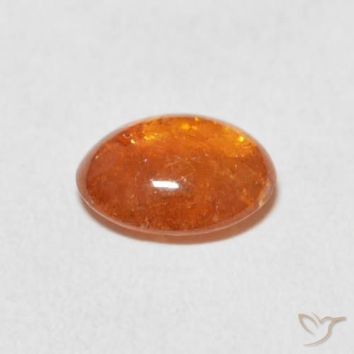 Granada espessartita Laranja Médio Natural 1.91ct, oval, Transparente
