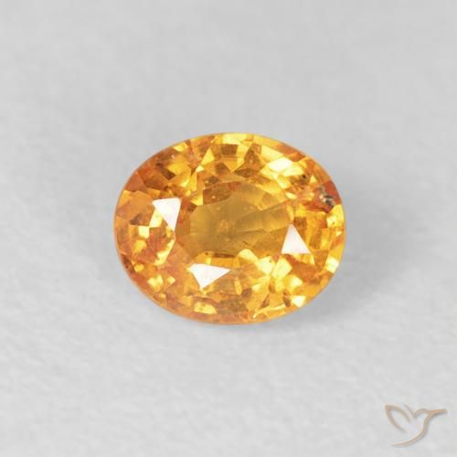 0.57ct Natural Laranja-Ouro Granada espessartita, oval, VS