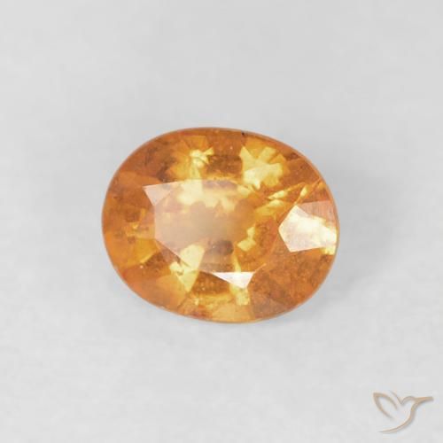 Granada espessartita Laranja brilhante Natural 0.49ct, oval, VS-SI