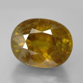 Esfena amarelo natural 11,45ct, corte oval, SI