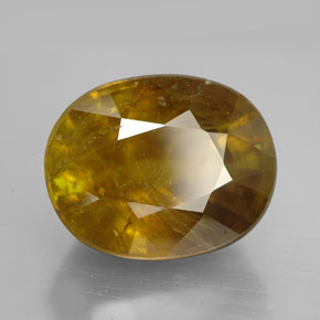 Esfena amarelo natural 11,45ct, corte oval, SI