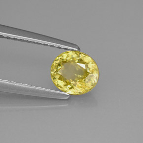 Esfena amarelo natural 0,75ct, corte oval, VS