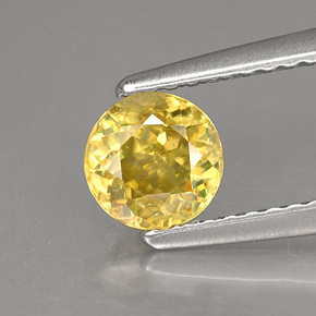 Esfena amarelo natural 0,72ct, corte redondo, SI
