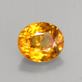 Esfena laranja dourado natural 1,21ct, corte oval, VS