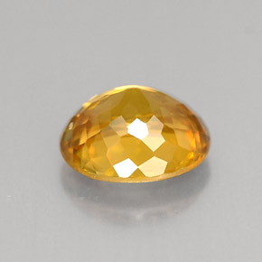 Esfena laranja dourado natural 1,21ct, corte oval, VS