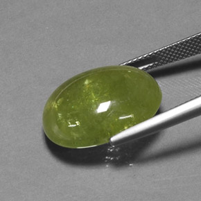Esfena verde natural 21,01ct, corte oval, translúcido