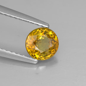 Esfena amarelo natural 0,79ct, corte redondo, SI