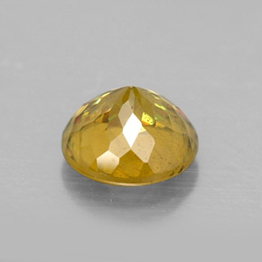 Esfena ouro natural 0,74ct, corte redondo, SI