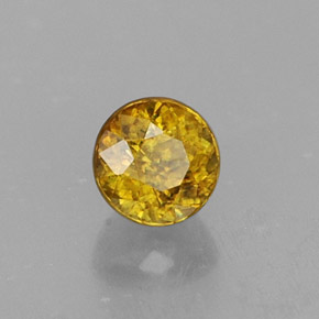 Esfena ouro natural 0,54ct, corte redondo, VS