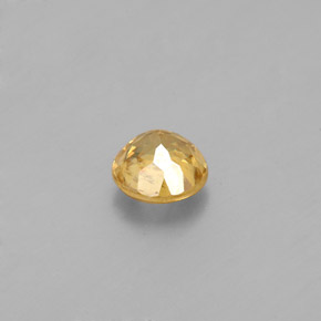 Esfena amarelo natural 0,55ct, corte redondo, SI