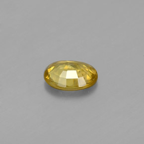 Esfena amarelo natural 0,54ct, corte oval, SI
