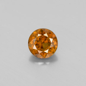 Esfena ouro natural 0,57ct, corte redondo, VS