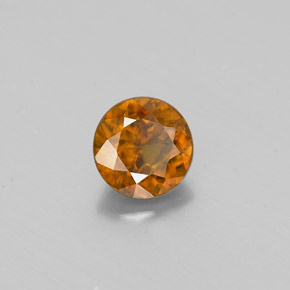 Esfena ouro natural 0,57ct, corte redondo, VS