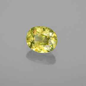 Esfena Verde Dourado Natural 0.83ct, Corte Oval, VS