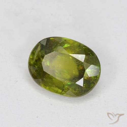 Esfena Verde Terroso Quente Natural 0.83ct, oval, VS-SI