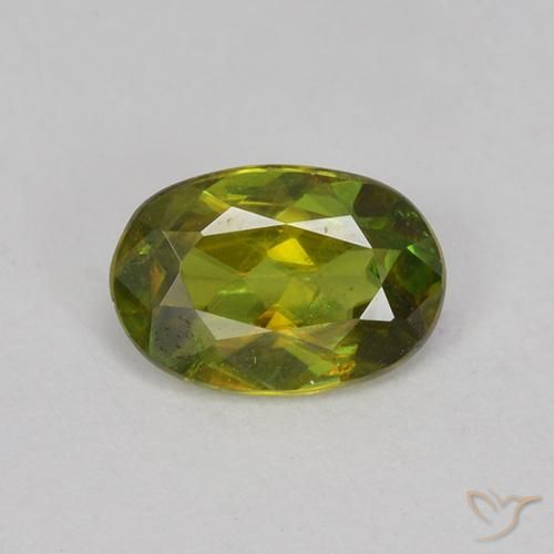 0.60ct Natural Verde Terroso Quente Esfena, oval, VVS-VS